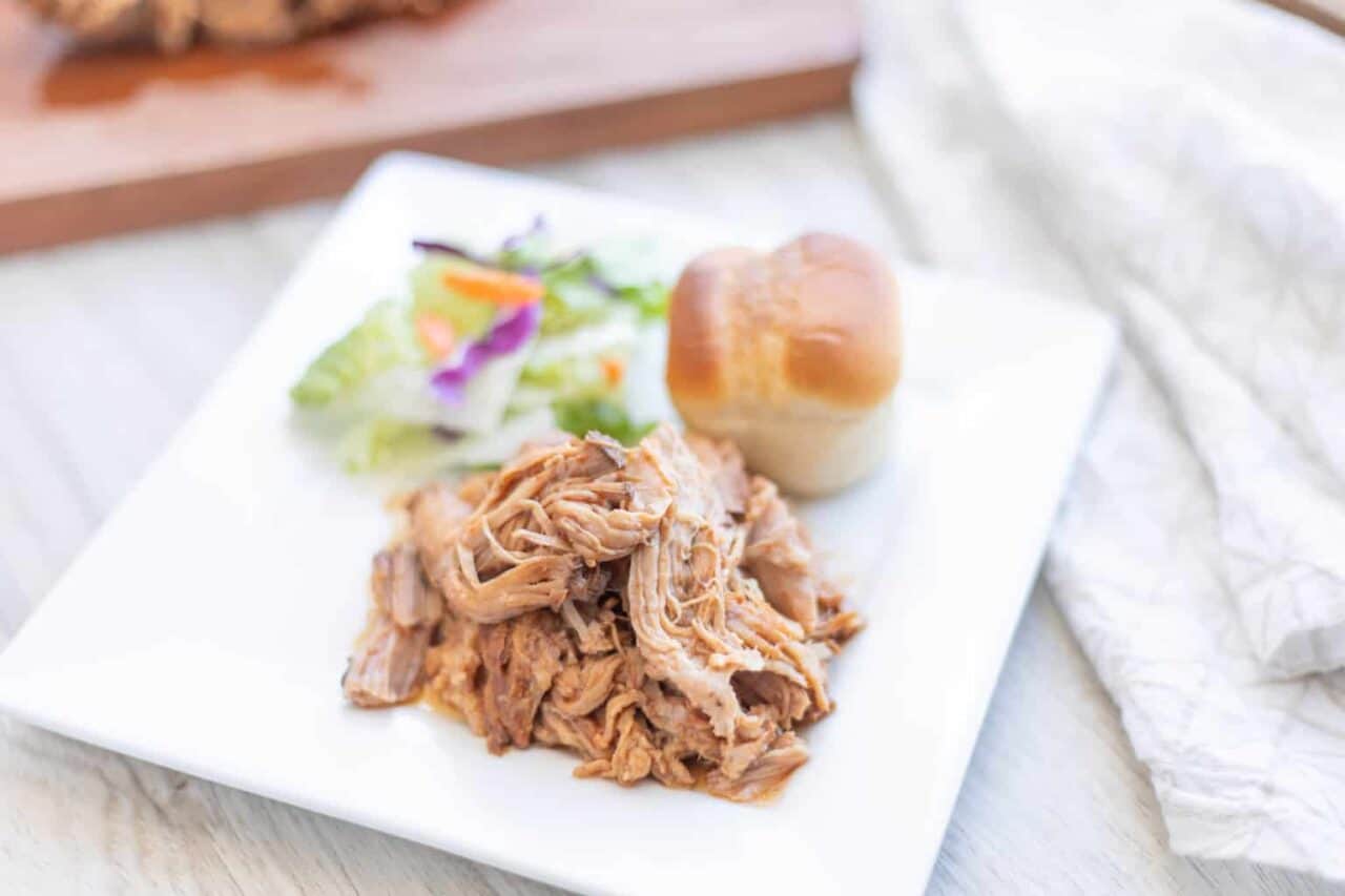 A plate of food on a table, with Pork