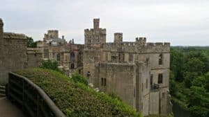 A castle sitting on the side of a building