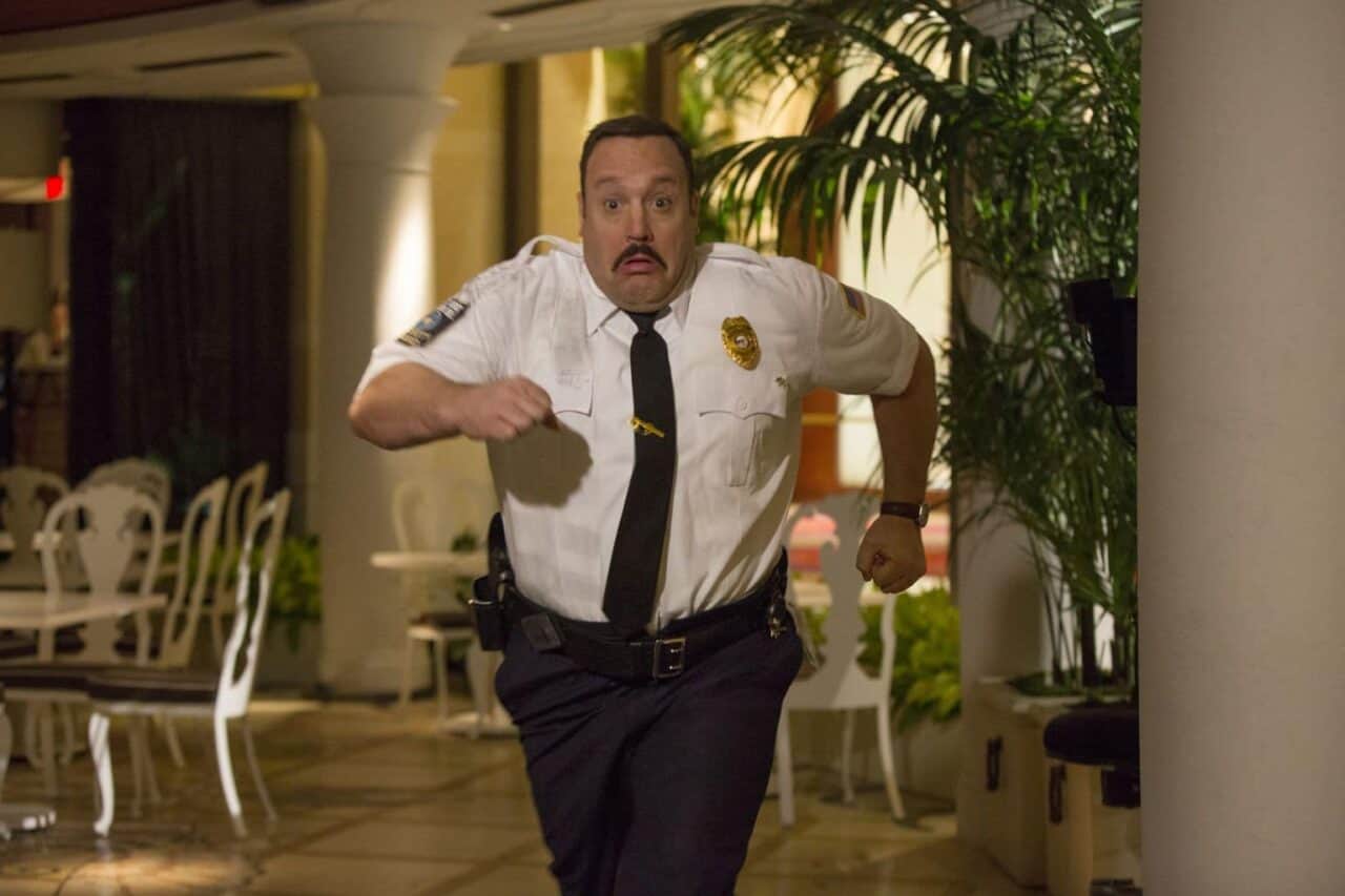 Kevin James standing in a room