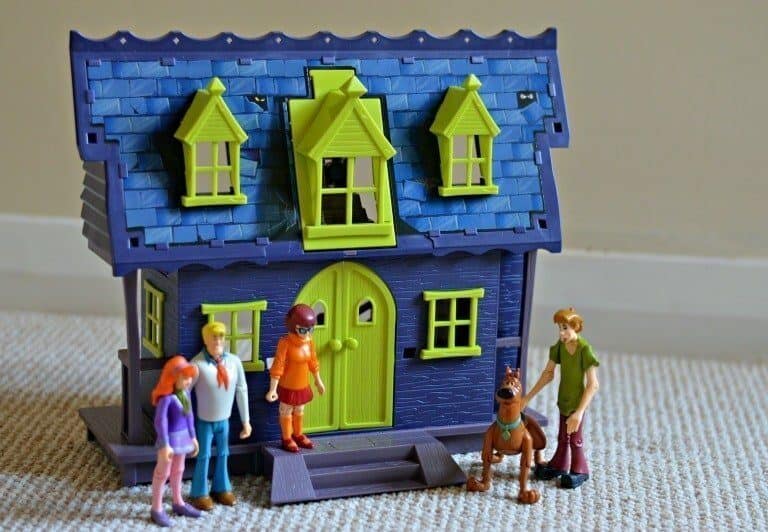 A group of people standing in front of a toy