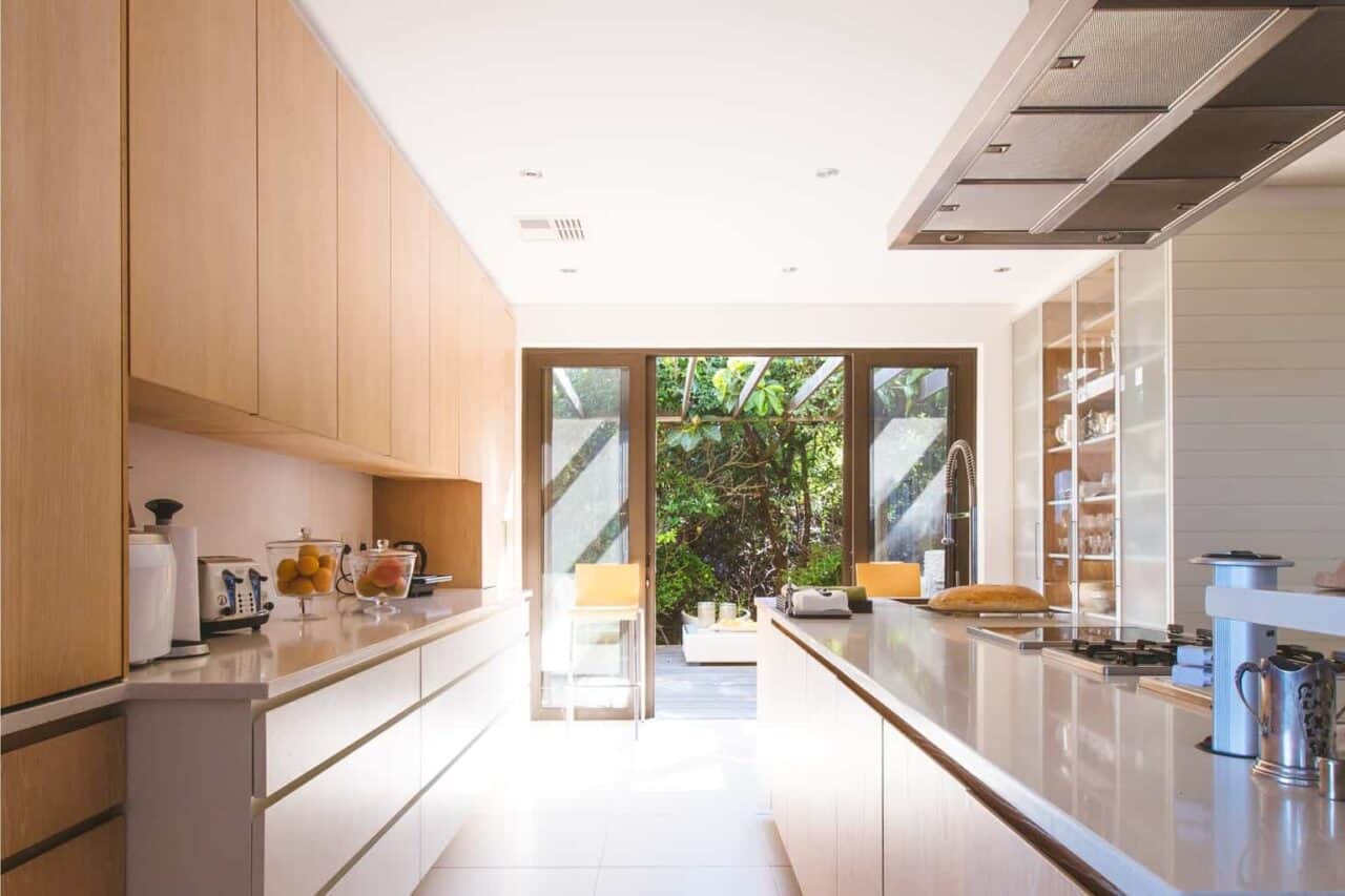 A kitchen with a sink and a window