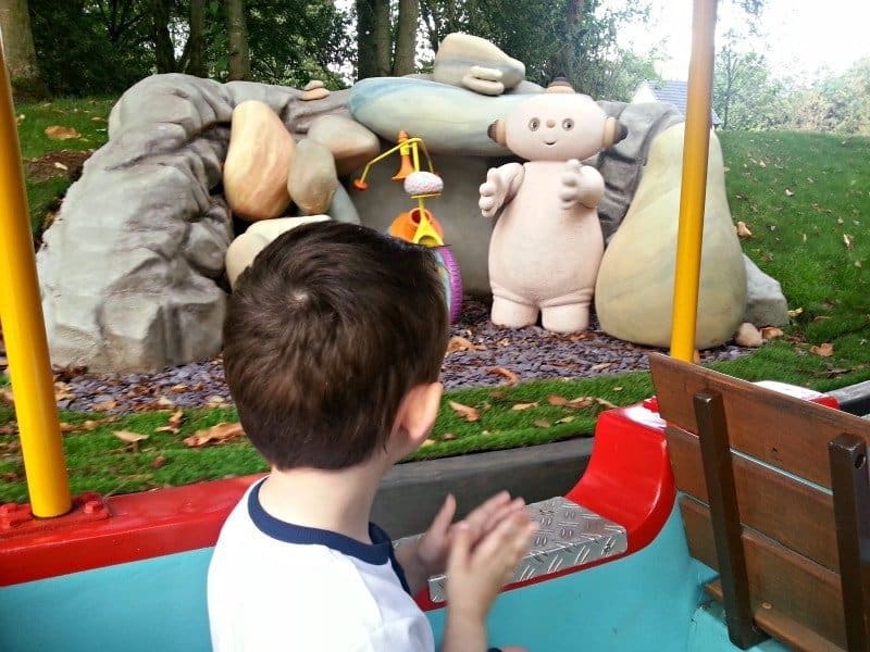 A little boy that is holding a bat