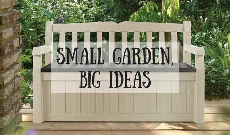 A sign in front of a brick wall