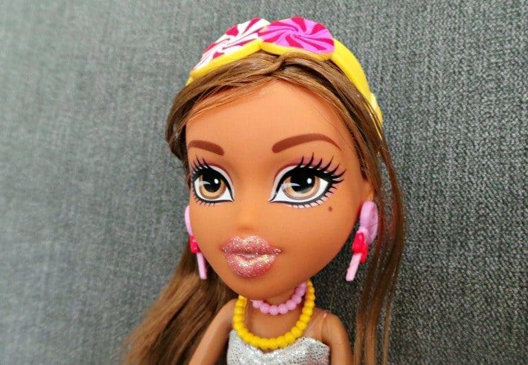 A close up of a toy doll
