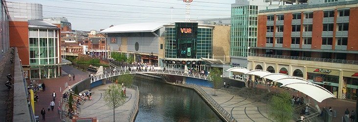 A bridge over a river in a city