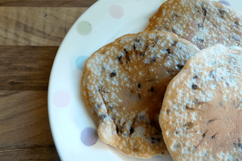 A close up of food on a plate, with Cake and Pancake