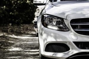 A car parked in front of a mirror posing for the camera