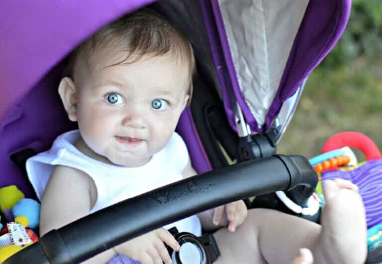 A close up of a person holding a baby