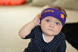 A little boy wearing a hat