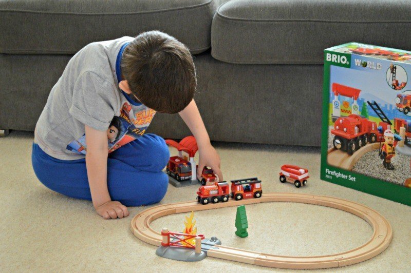 A little boy sitting on a table