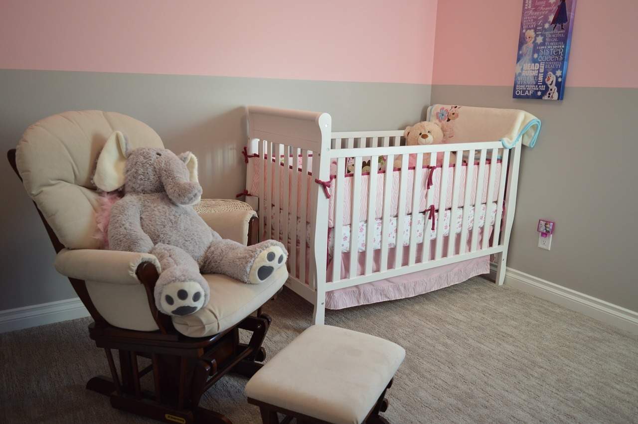 A bedroom with a stuffed animal