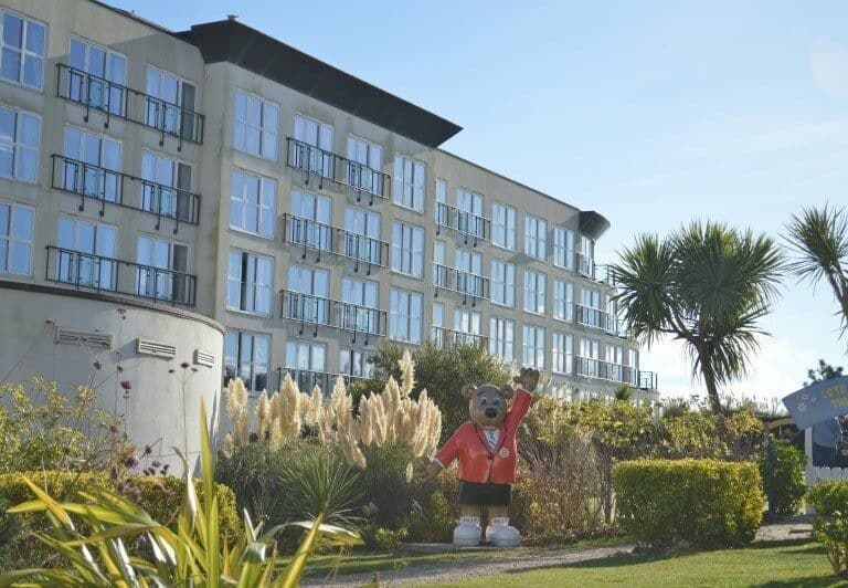 A person standing in front of a building