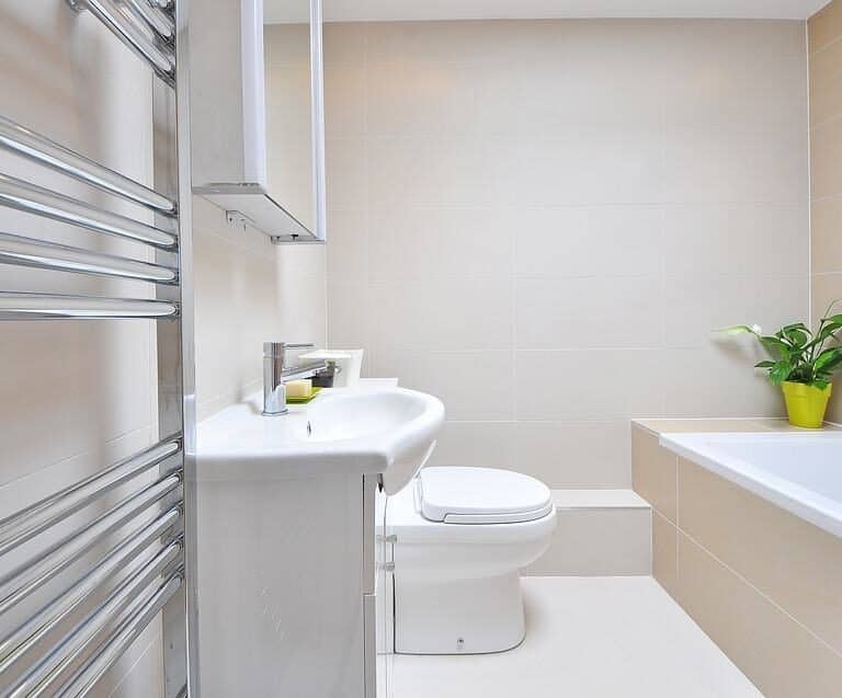 A room with a sink and a shower