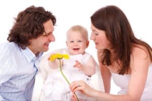 A person holding a baby