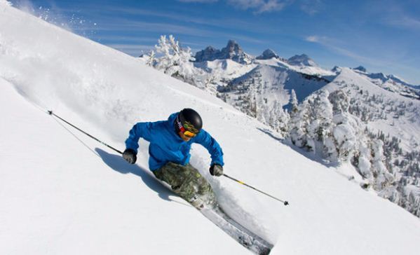 A man skiing down a mountain