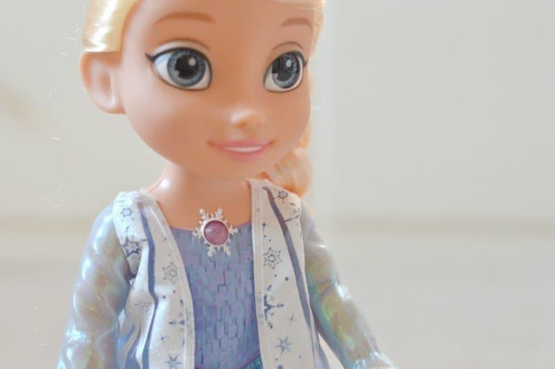 A close up of a toy doll