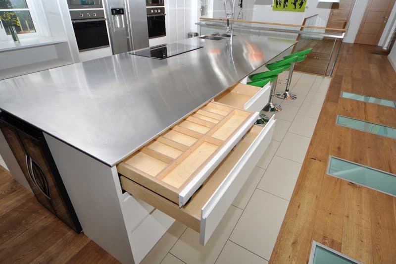 A kitchen with a wood floor