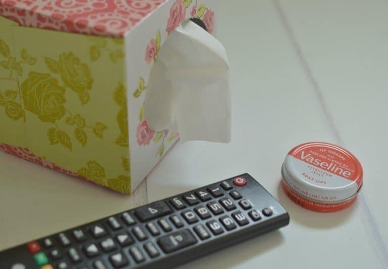 A remote control sitting on top of a table