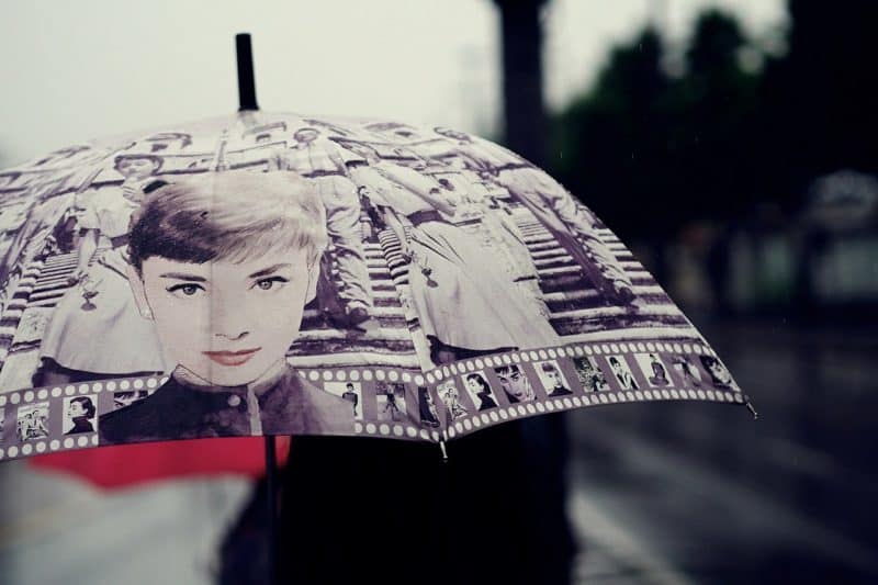 A person holding an umbrella