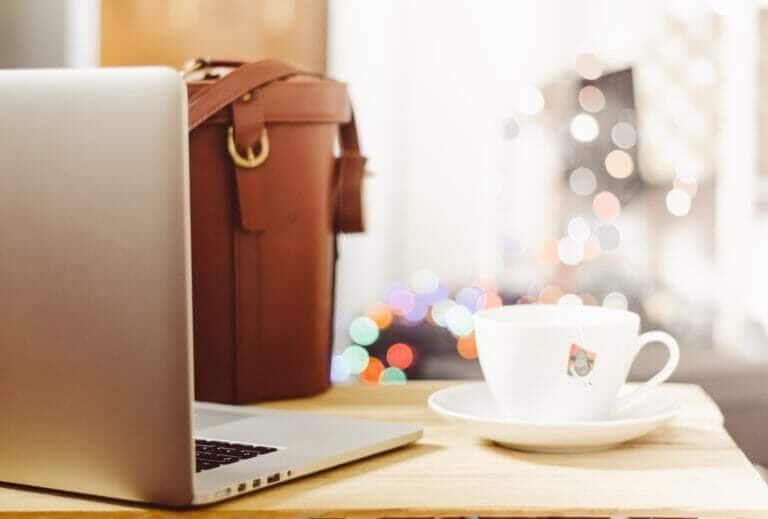 A cup of coffee on a table, with Tea