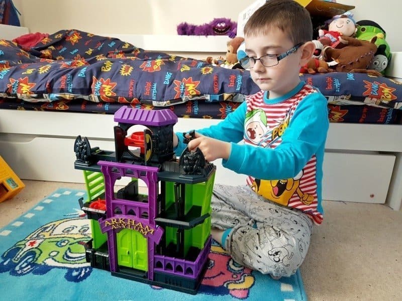 A little boy sitting on a table