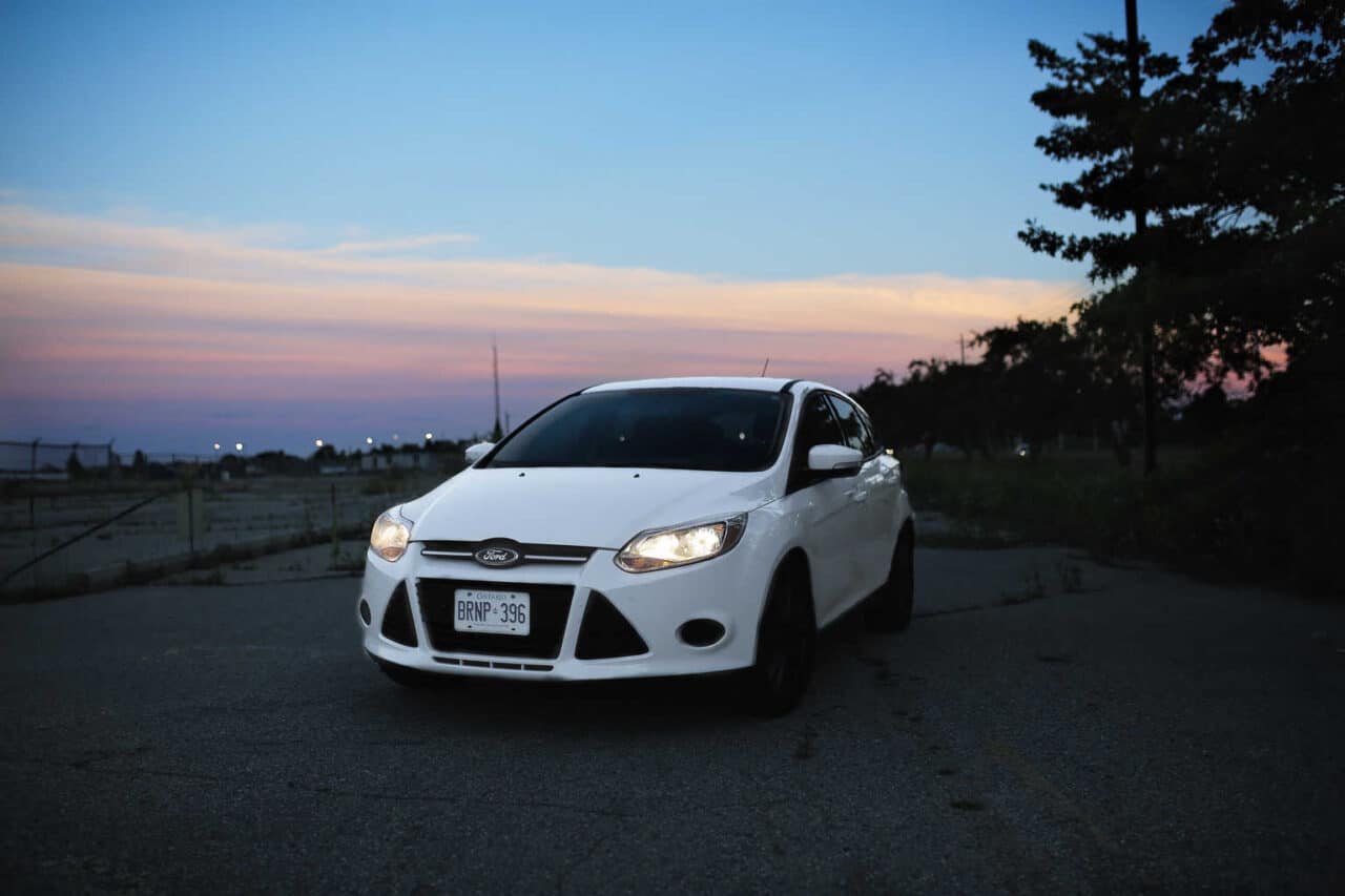 A car parked on the side of a road