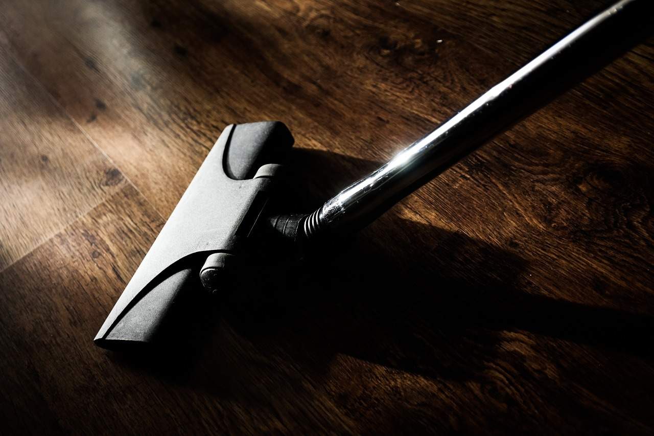 A knife sitting on top of a wooden table