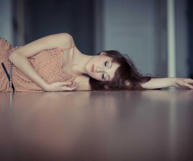 A woman lying on a bed