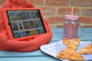 A slice of pizza sitting on top of a table