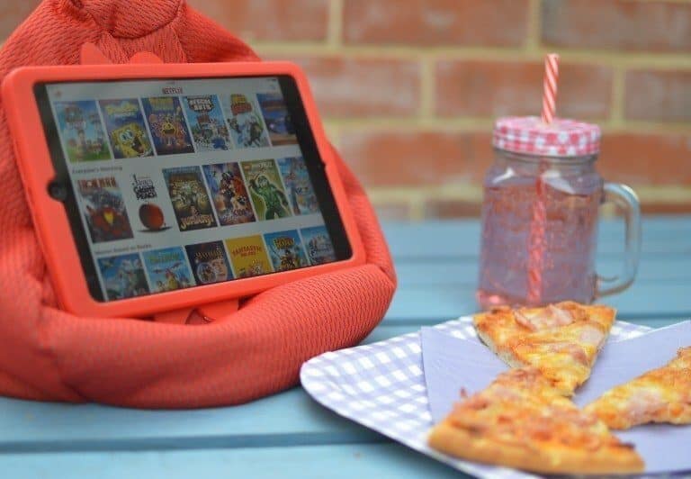 A slice of pizza sitting on top of a table