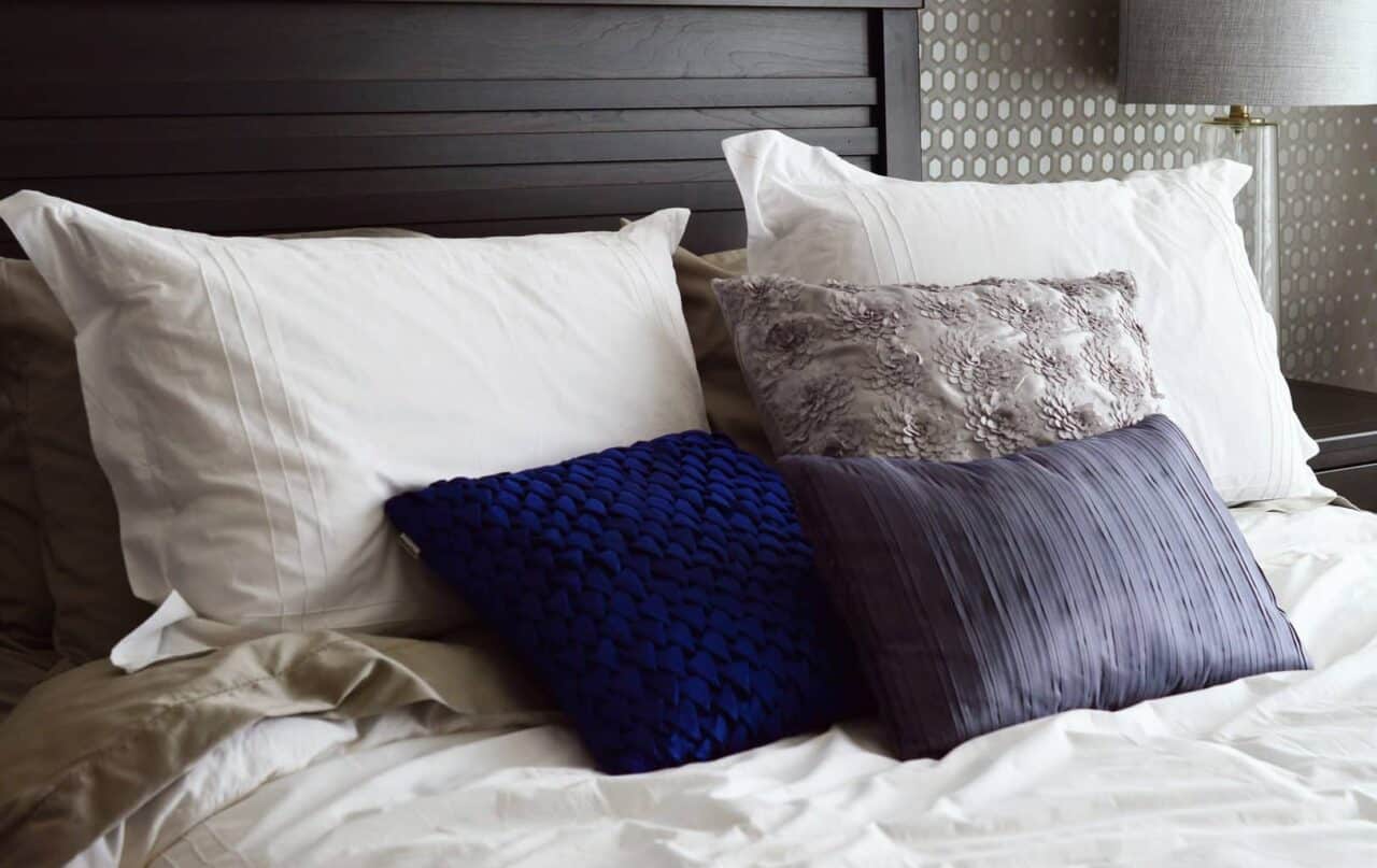 A made bed in a hotel room