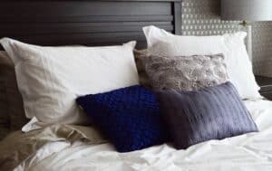 A made bed in a hotel room