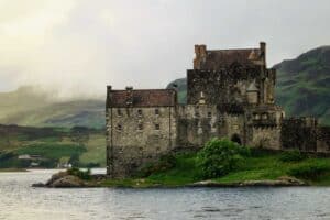 A castle with Urquhart Castle in the background