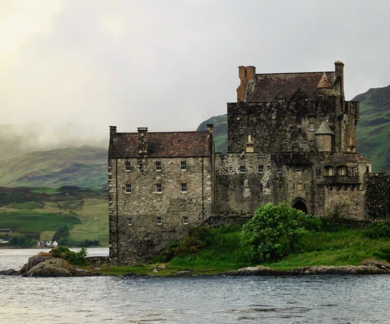 A castle with Urquhart Castle in the background