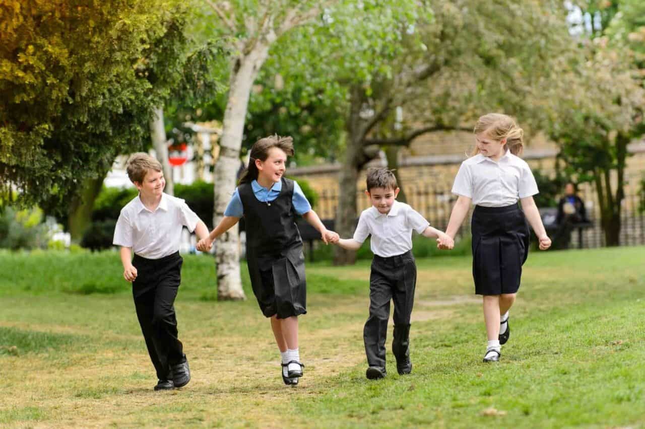 A group of people playing in a park