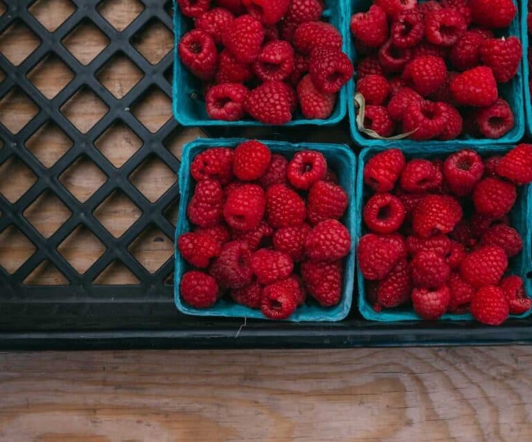 A box of fruit and vegetable stand