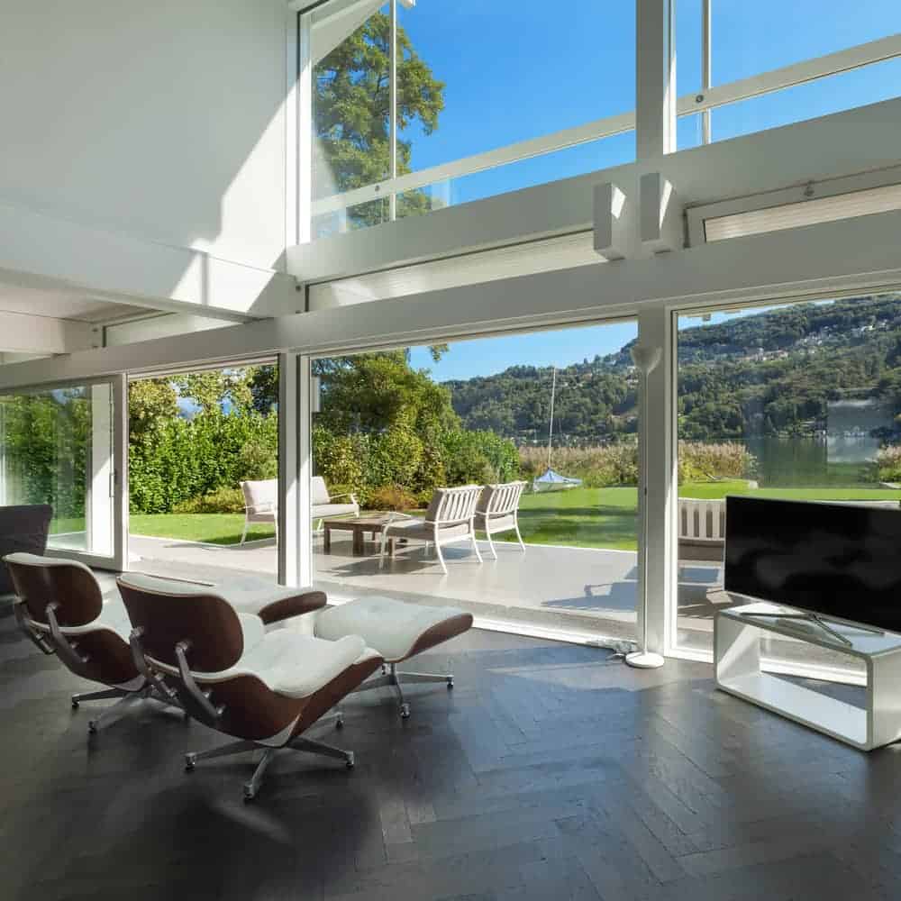 A living room filled with furniture and a large window