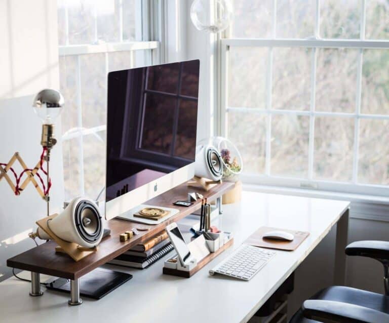 A dining room table in front of a window