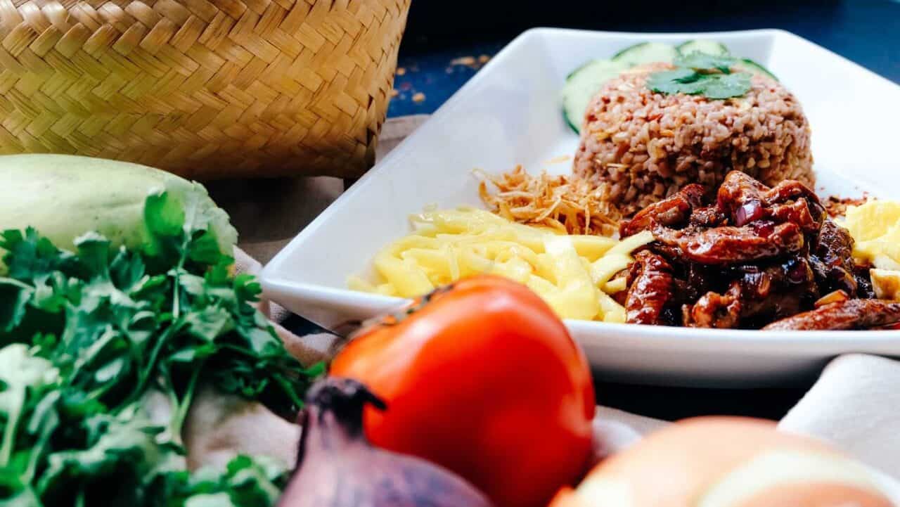 A box filled with different types of food on a plate