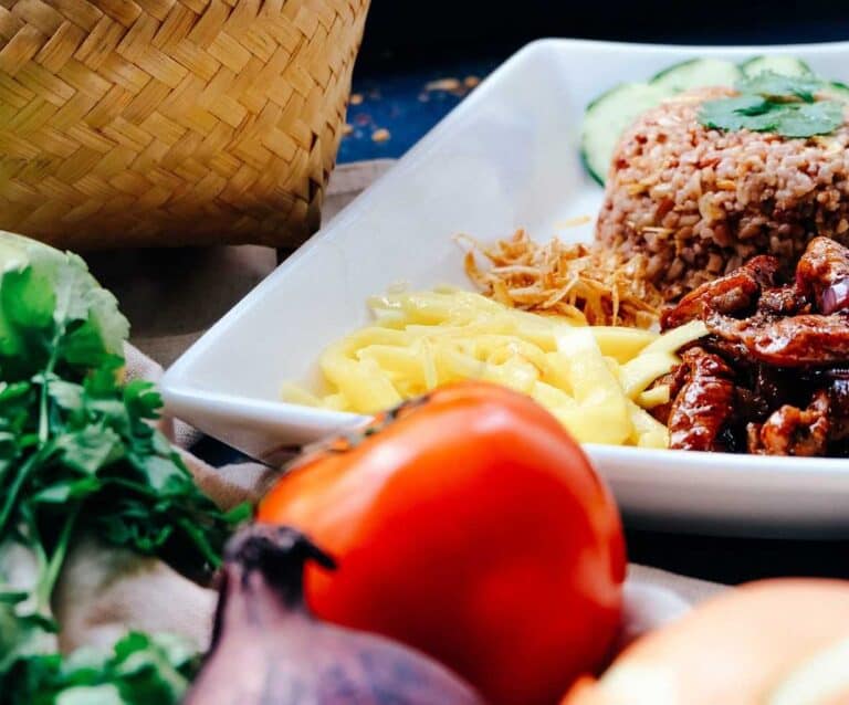 A box filled with different types of food on a plate