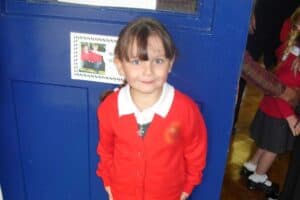 A little boy posing for a picture