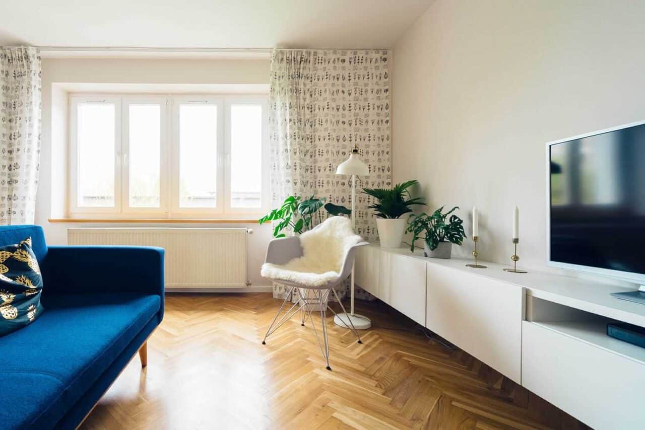 A living room filled with furniture and a large window