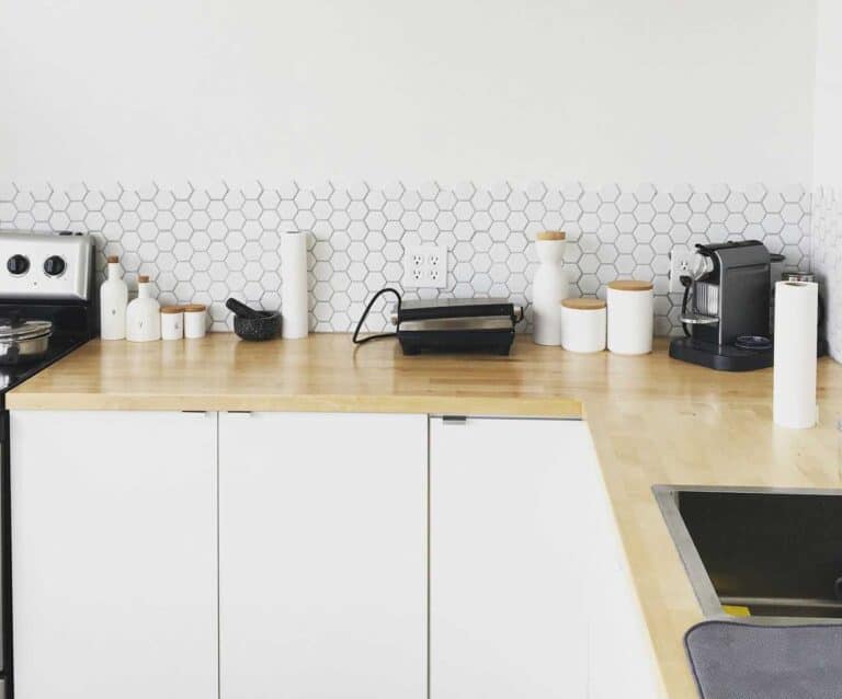 A stove top oven sitting inside of a kitchen