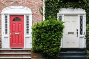 A door is open in front of a house