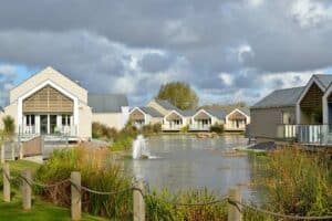 A small house surrounded by water