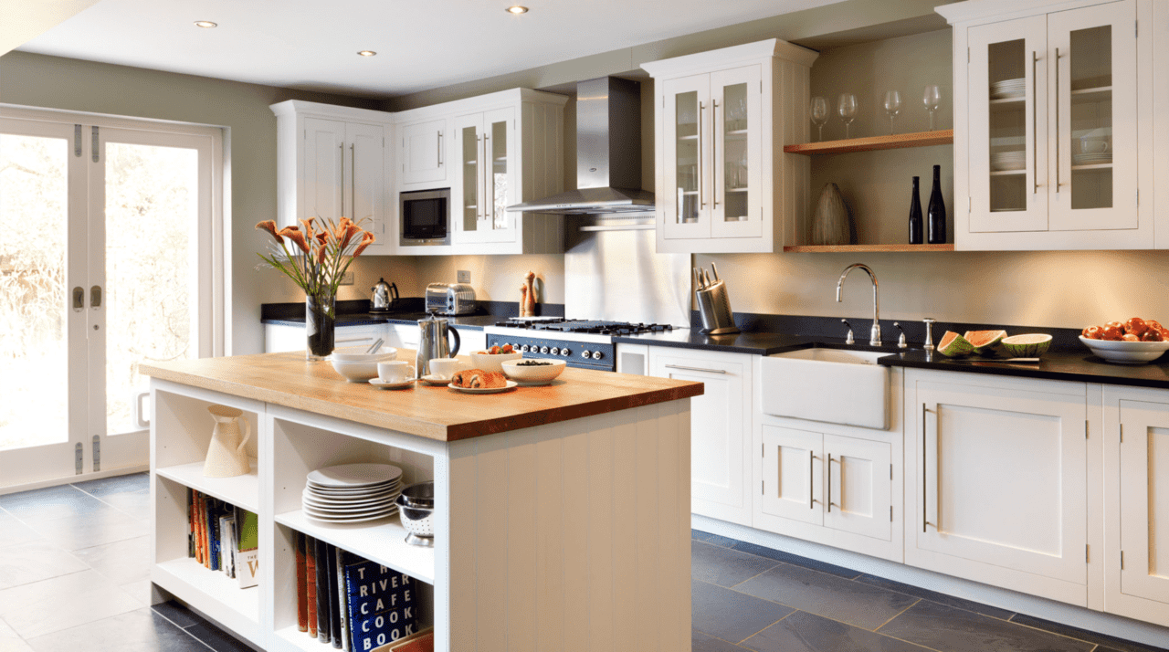 A kitchen with a sink and a window