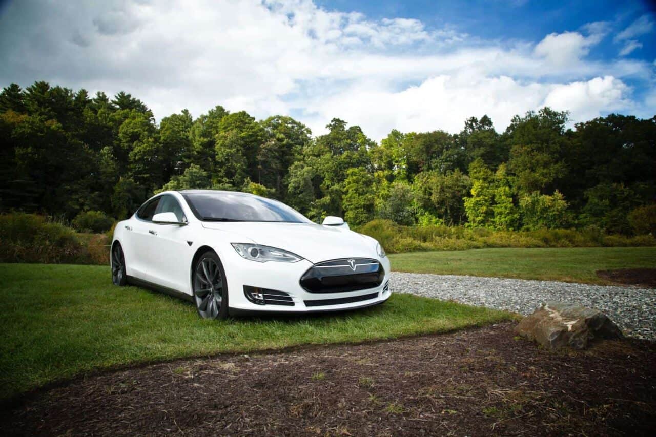 A car parked in a grassy field