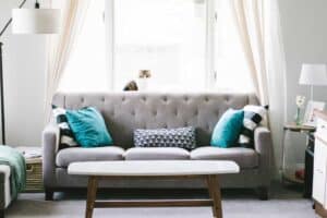 A living room filled with furniture and a window