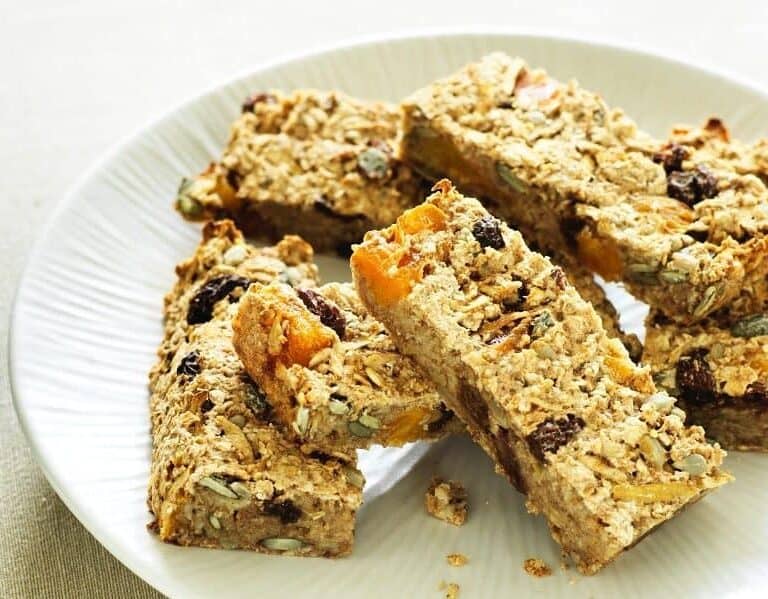 A piece of bread on a plate, with Muesli