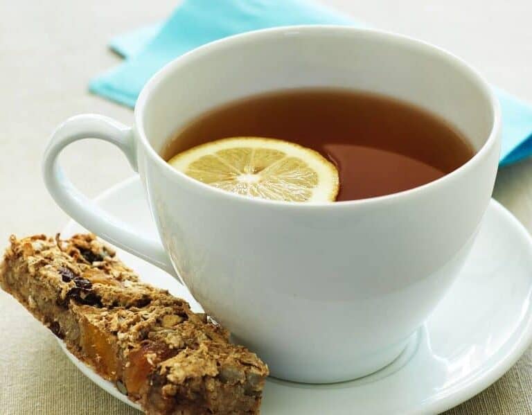 A plate of food and a cup of coffee, with Sugar and Health